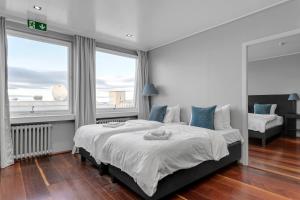 Postel nebo postele na pokoji v ubytování Máni Apartments