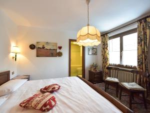 Postel nebo postele na pokoji v ubytování Residence Salvan