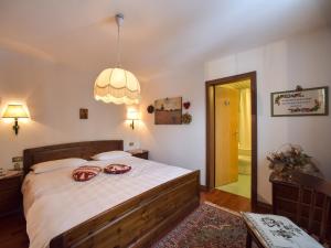 Postel nebo postele na pokoji v ubytování Residence Salvan