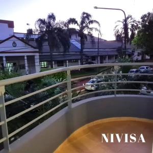 a balcony with a nisska sign on it at Edificio NIVISA in Posadas