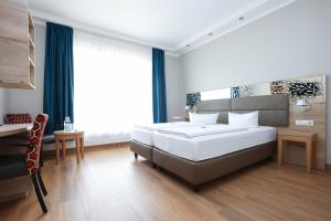 Hotel Blaubeurer Tor客房内的一张或多张床位