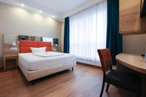Hotel Blaubeurer Tor客房内的一张或多张床位