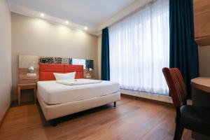 Hotel Blaubeurer Tor客房内的一张或多张床位
