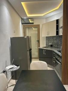 Köök või kööginurk majutusasutuses Apprt ima 1bed front station TGV