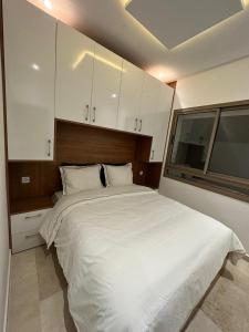 Voodi või voodid majutusasutuse Apprt ima 1bed front station TGV toas