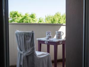 A balcony or terrace at B&B Zelmirà