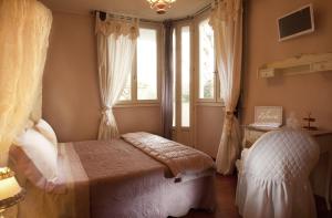A bed or beds in a room at B&B Zelmirà