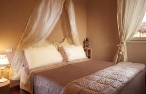 A bed or beds in a room at B&B Zelmirà