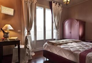 A bed or beds in a room at B&B Zelmirà