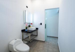 Koupelna v ubytování Instyle Residences at RIZZ SUITES