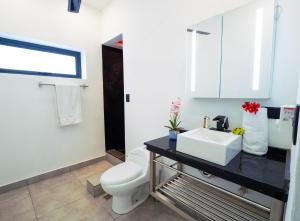 Koupelna v ubytování Instyle Residences at RIZZ SUITES