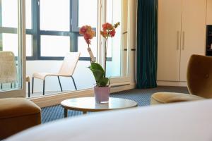 Posezení v ubytování Best Western Hotel du Pont Wilson