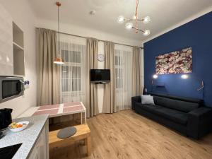 Telewizja i/lub zestaw kina domowego w obiekcie Urban by BestChoice - FREE Parking - Self Check-in