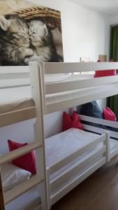 Postel nebo postele na pokoji v ubytování Alpen Apartments Zell am See