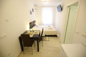 TV/Unterhaltungsangebot in der Unterkunft Sites Of Zadar Rooms