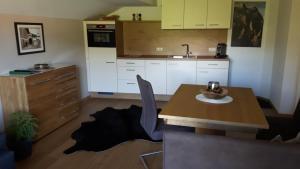 Kuchyň nebo kuchyňský kout v ubytování Alpen Apartments Zell am See