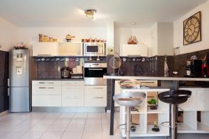 Virtuvė arba virtuvėlė apgyvendinimo įstaigoje Les Terrasses des Calanques