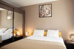Katil atau katil-katil dalam bilik di Appartement Evasion