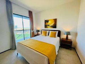 Giường trong phòng chung tại Paradise on Praia do Barro Preto +37 ảnh