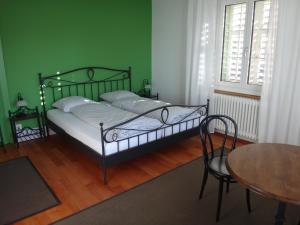 Postel nebo postele na pokoji v ubytování BnB Hopfengrün Langenthal
