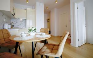 Posedenie v ubytovaní Apartament Lux I , Kołobrzeg Aqua Polanki , Baseny , Sauny , Siłownia