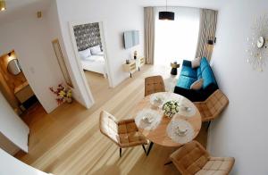 Posedenie v ubytovaní Apartament Lux I , Kołobrzeg Aqua Polanki , Baseny , Sauny , Siłownia