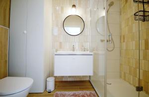 Kúpeľňa v ubytovaní Apartament Lux I , Kołobrzeg Aqua Polanki , Baseny , Sauny , Siłownia