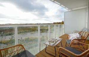 Balkón alebo terasa v ubytovaní Apartament Lux I , Kołobrzeg Aqua Polanki , Baseny , Sauny , Siłownia