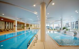 Bazén v ubytovaní Apartament Lux I , Kołobrzeg Aqua Polanki , Baseny , Sauny , Siłownia alebo v jeho blízkosti