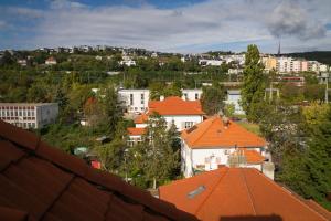an overhead view of a city with orange roofs at Maisonette Apartment with Terrace in Koliba