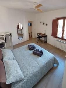 Ένα ή περισσότερα κρεβάτια σε δωμάτιο στο My Tuscany House - C3