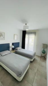 Postel nebo postele na pokoji v ubytování Estepona South bay + 16 fotografií