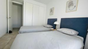 Postel nebo postele na pokoji v ubytování Estepona South bay
