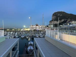 a view of a marina with boats in the water at Marina Club - Luxury Apartment in Ocean Village in Gibraltar