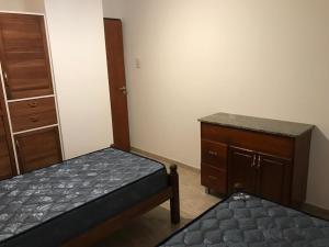 Ένα ή περισσότερα κρεβάτια σε δωμάτιο στο BUENOS AIRES 2 - MICA