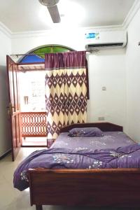 Een bed of bedden in een kamer bij Rafiki Guest House