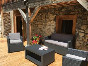 Posedenie v ubytovaní Appartement cosy pour 6 personnes avec parking au Grand-Bornand - FR-1-467-84