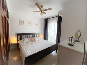 Posteľ alebo postele v izbe v ubytovaní Casa de amigos Lomas Del Golf, Orihuela Costa