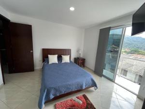 Postel nebo postele na pokoji v ubytování Penthouse San Rafael