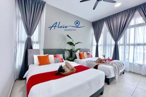 Voodi või voodid majutusasutuse Atlantis Melaka I 5-11pax I 5min JonkerSt BY Alviv Management toas