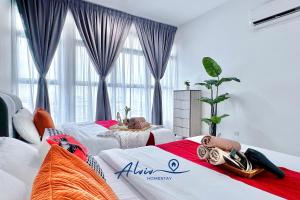 Voodi või voodid majutusasutuse Atlantis Melaka I 5-11pax I 5min JonkerSt BY Alviv Management toas