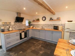 Kuchyň nebo kuchyňský kout v ubytování Apple Tree Cottage + 20 fotografií