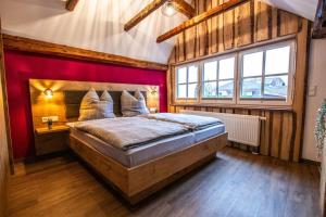 Postel nebo postele na pokoji v ubytování Torwärterhaus mit Geschichte
