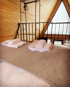 A bed or beds in a room at Welcome Cottage