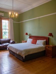 En eller flere senge i et værelse på Heritage Villa Tamboerskloof