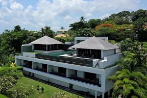 an aerial view of a building with trees at Villa Princess Stephanie in Kata Beach