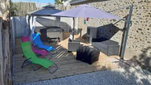 Patio nebo venkovní prostory v ubytování Superbe Gîte bord de mer avec jacuzzi 6 personnes