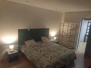 Ένα ή περισσότερα κρεβάτια σε δωμάτιο στο APPARTEMENT DE GUISE 7
