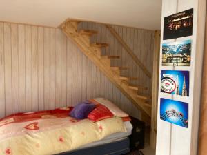 Letto o letti in una camera di Beach escape to Pichilemu - Not so tiny house