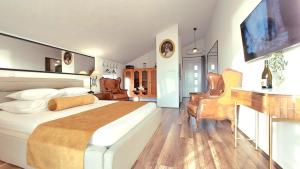 Postel nebo postele na pokoji v ubytování Refresh Boutique Apartments